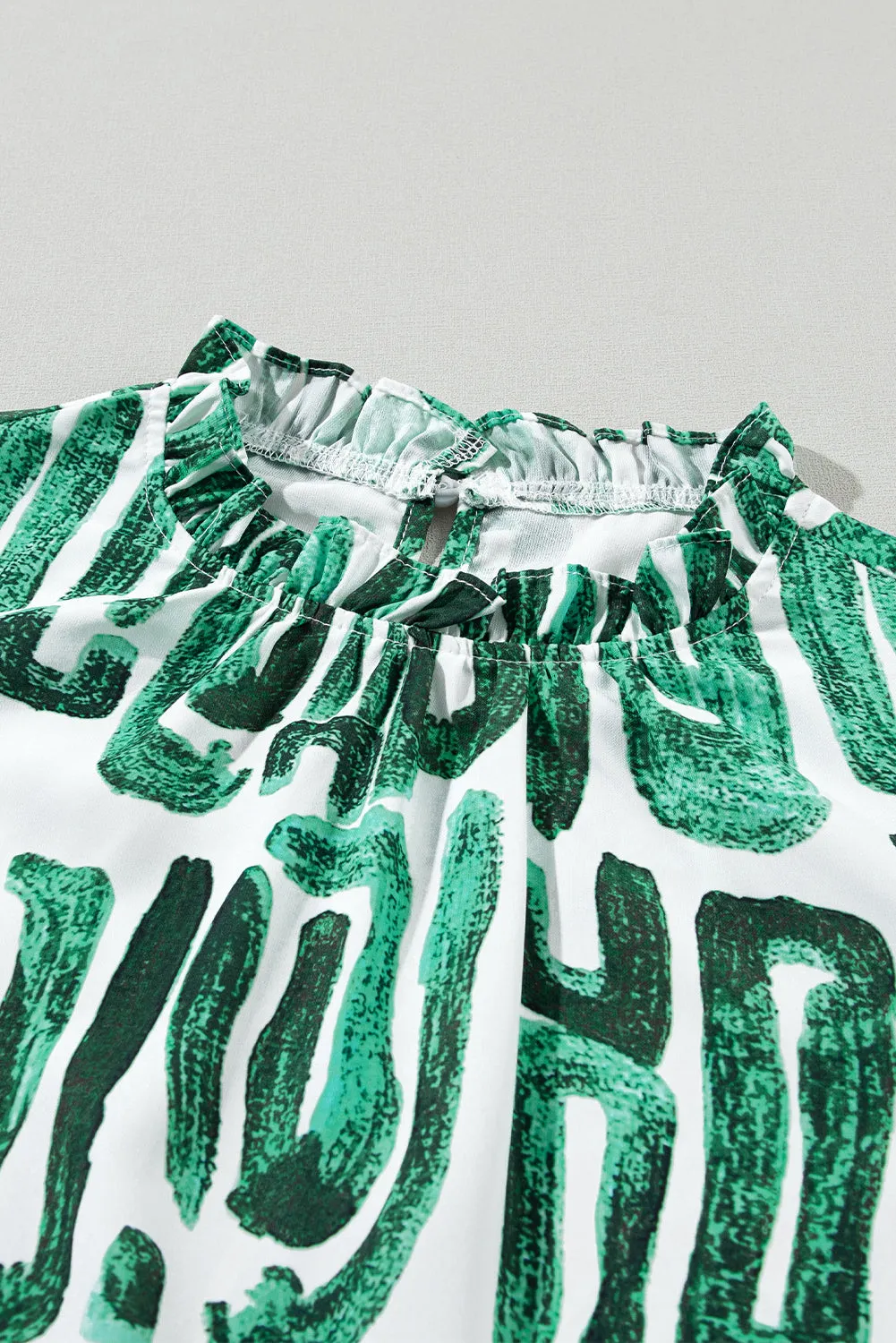 Embroidered Puff Sleeve Frilled Neck Printed Top